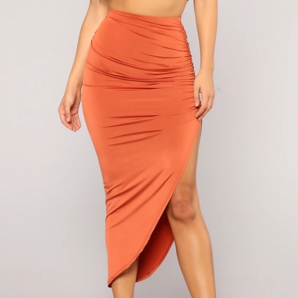 Fashion Nova Dresses & Skirts - Satin rust asymmetrical ruched open slit skirt